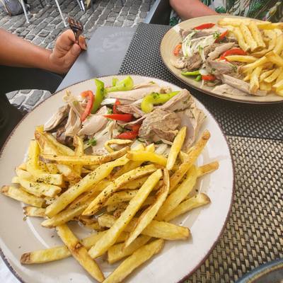 Atum escabeche - marinated tuna with peppers, onions and chips at Bar Praia da Laje, Seixal, Madeira