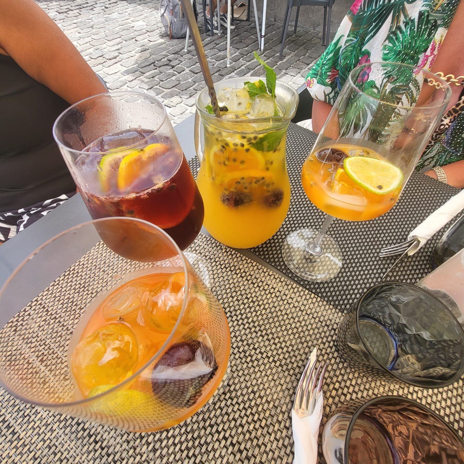 Sangria, passionfruit cocktail and spritzes on the cobbled terrace at Bar Praia da Laje, Seixal, Madeira