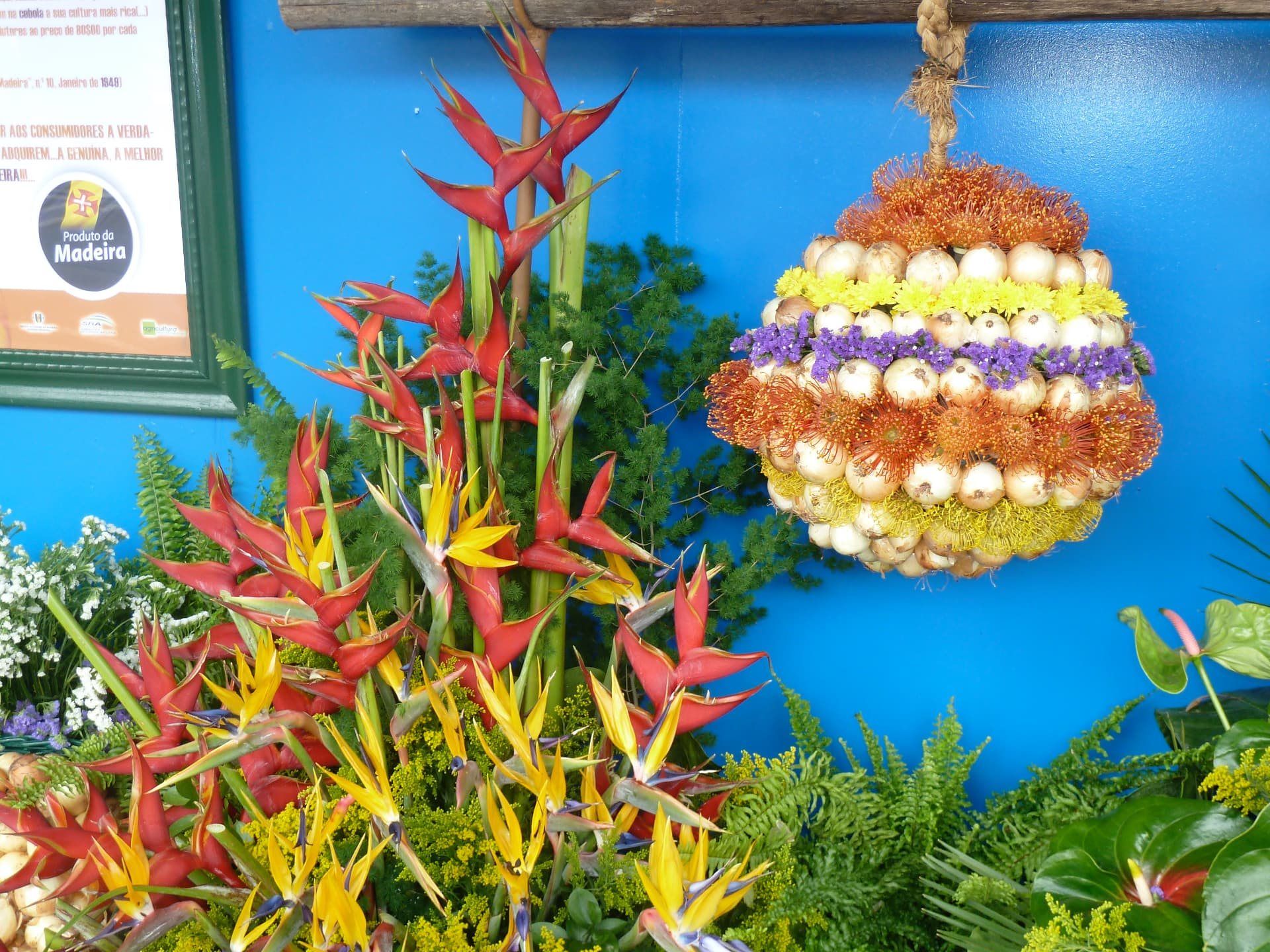 Close-up of onions arranged with flowers at the Festa da Cebola in Caniço.
