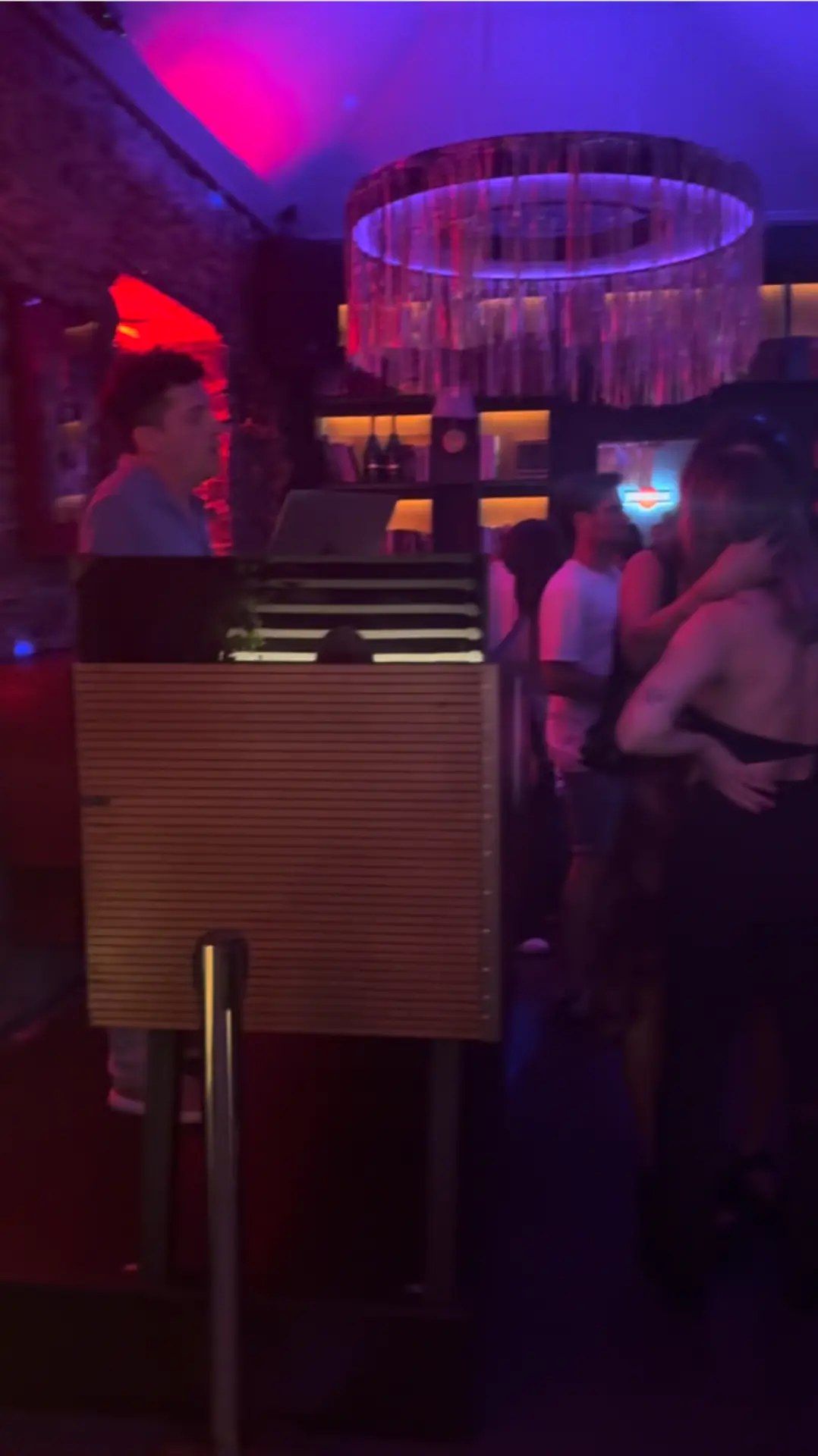 Dancefloor and neon chandelier bar at Böate nightclub in Funchal