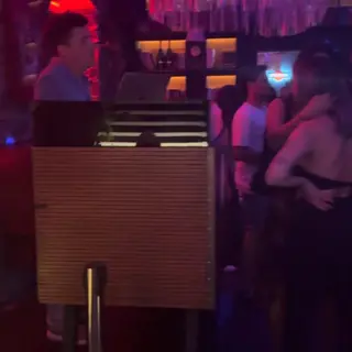 Dancefloor and neon chandelier bar at Böate nightclub in Funchal