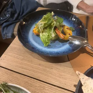 Grilled prawns with fresh garden salad at Horta restaurant on the Lido promenade in Funchal, Madeira