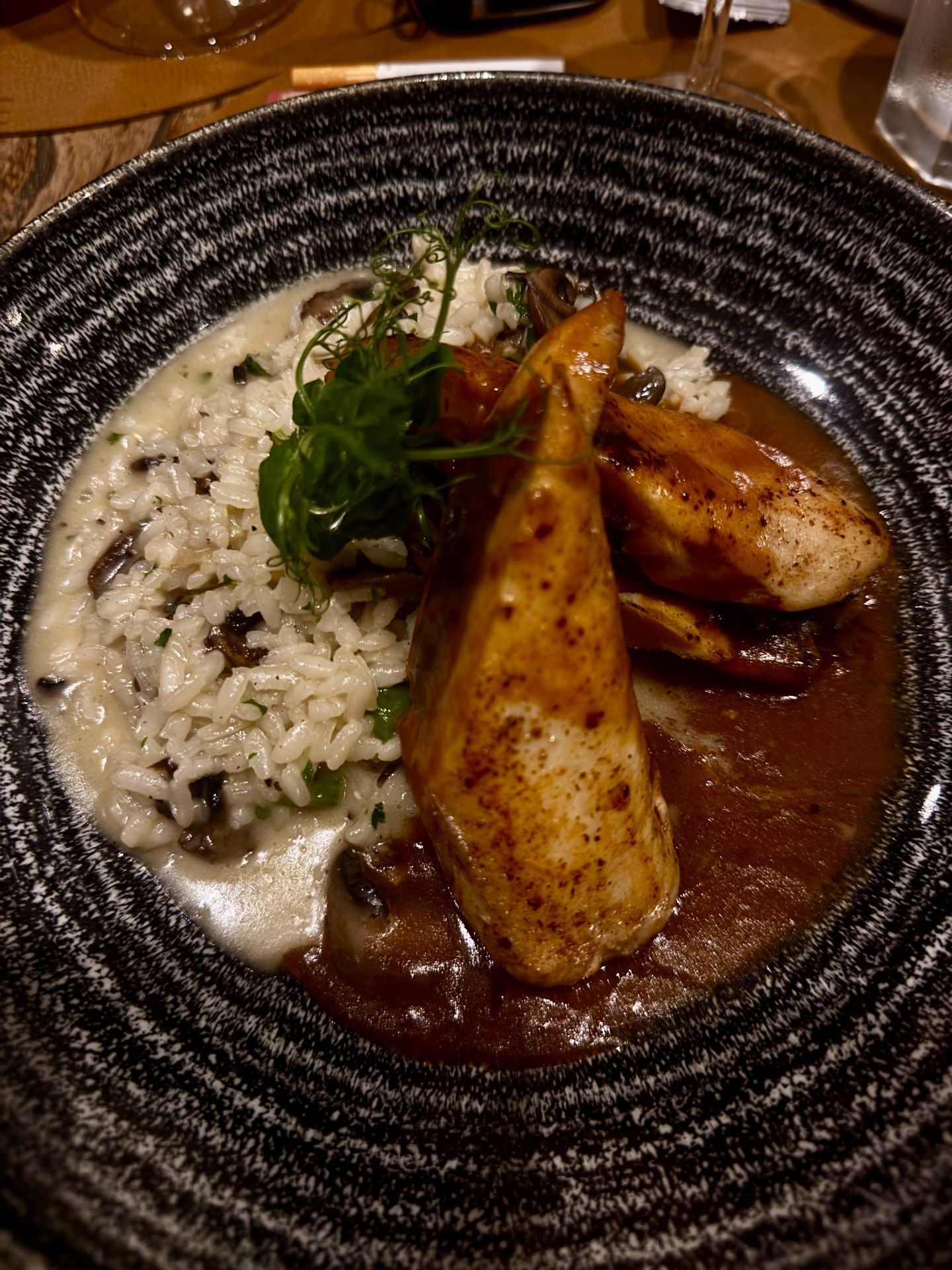 Grilled squid with seafood risotto at Il Basilico Tuscan restaurant on the Lido promenade in Funchal, Madeira