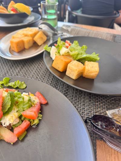 Milho frito, fried cornmeal cubes, with fresh salad at Rota dos Sabores restaurant, Santa Cruz, Madeira