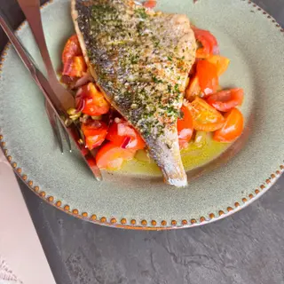 Grilled fish fillet with warm tomato, red onion and caper salsa at Sunspot Café, Ponta do Sol