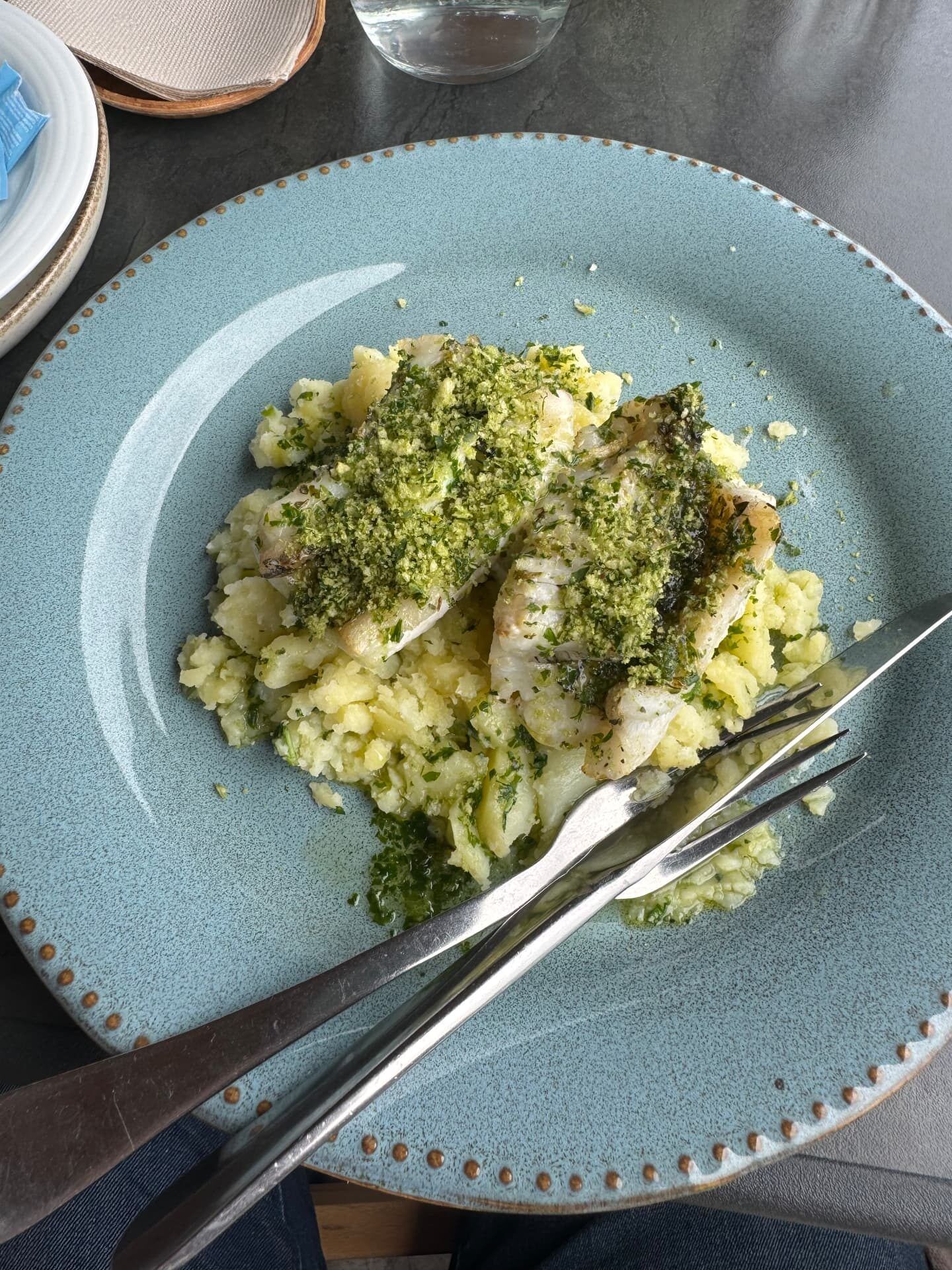 Herb-crusted fish over buttery crushed potatoes at Sunspot Café, Ponta do Sol