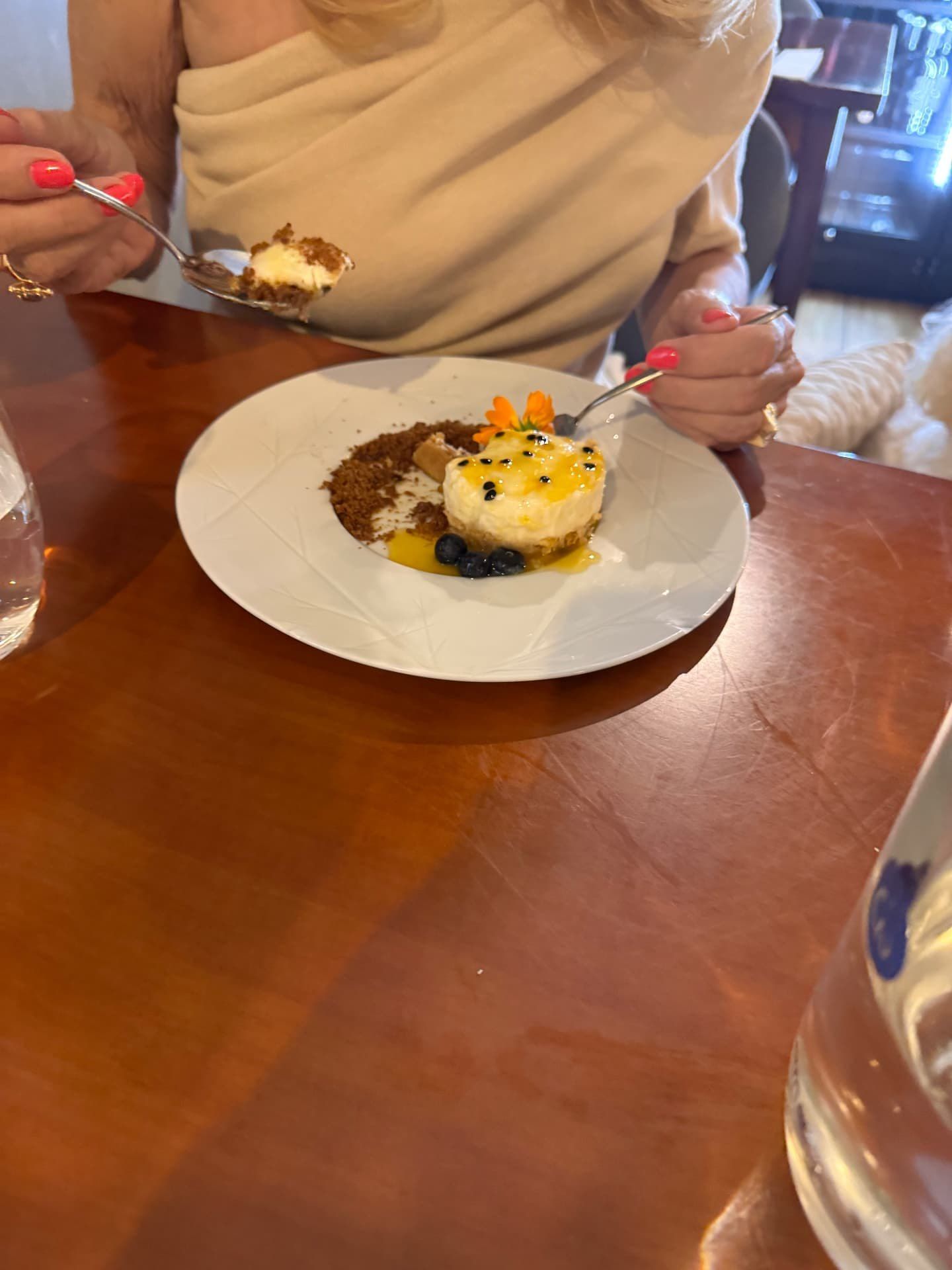 Passion fruit dessert with blueberries and crumble at 5 Sentidos restaurant, Funchal, Madeira