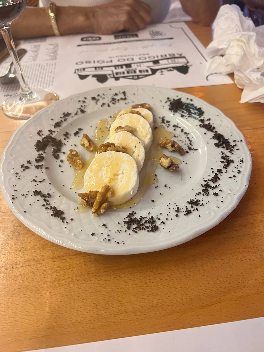Fresh cheese with honey and walnuts, the classic Madeiran starter at Casa de Abrigo do Poiso mountain restaurant on the road to Pico do Arieiro, Madeira