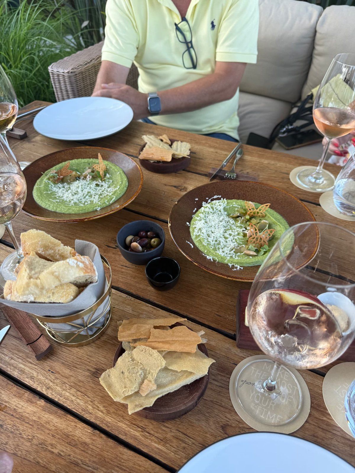 Lunch on the garden terrace at Avista restaurant, Funchal, Madeira, with green pea velouté starters, local bread and Portuguese rosé