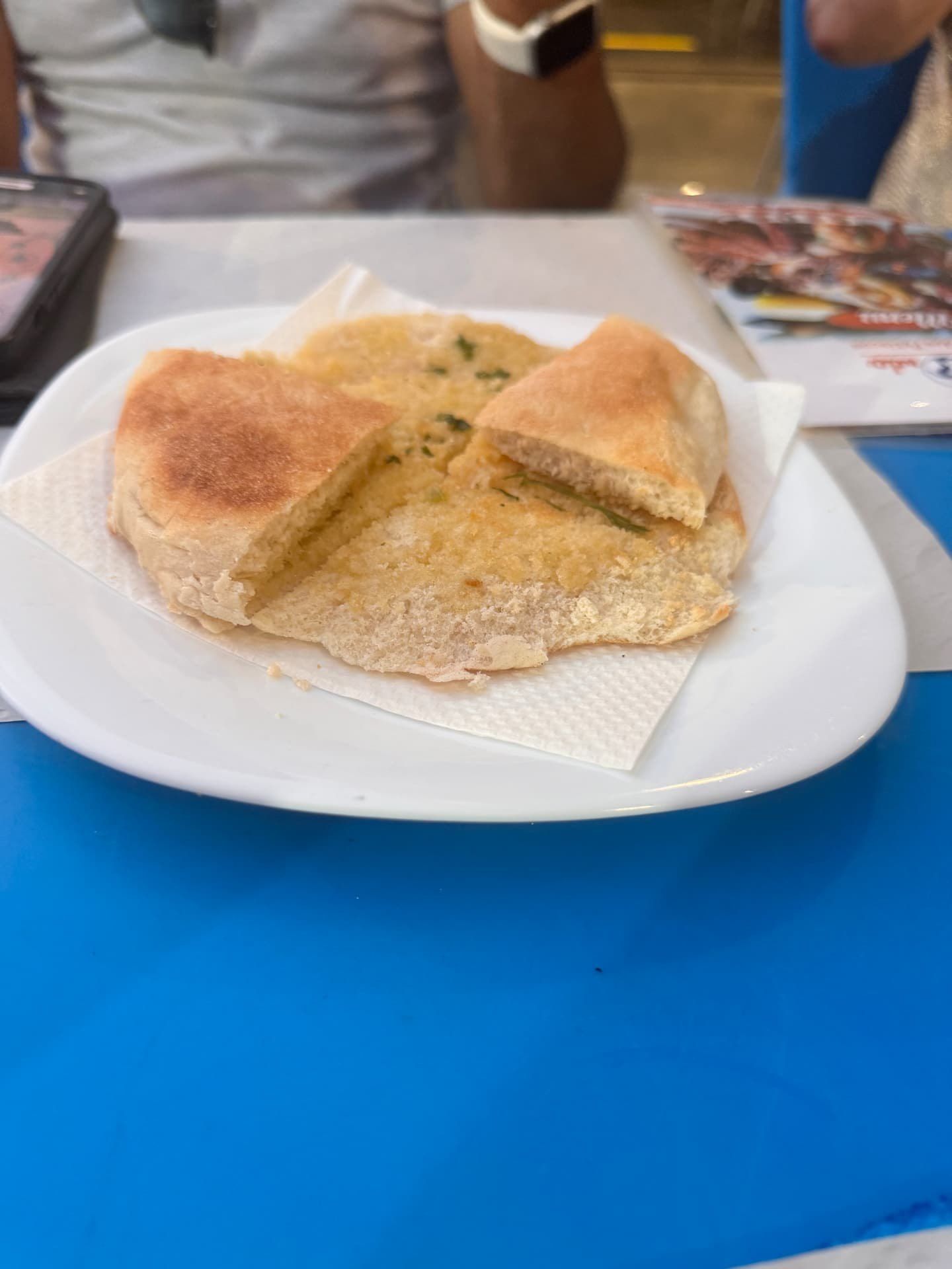 Bolo do caco flatbread with garlic butter and parsley at Nova Onda Cantinho dos Petiscos in Caniço de Baixo, Madeira