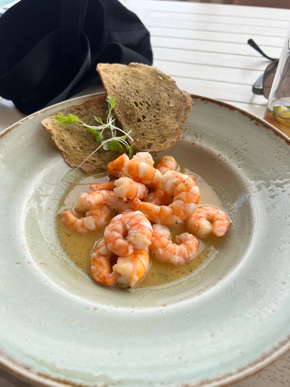 Prawns in garlic butter sauce with toasted sourdough at Recharge Restaurant, NEXT Hotel Madeira, Funchal