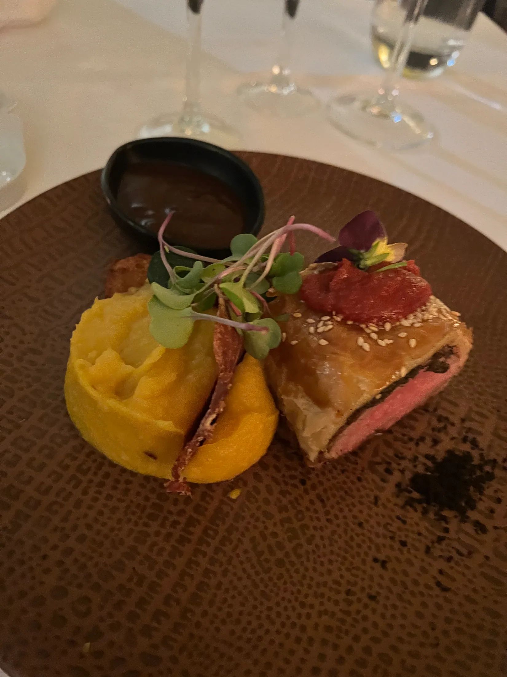 Lamb wellington and Sweet Potato in a rasting Jus