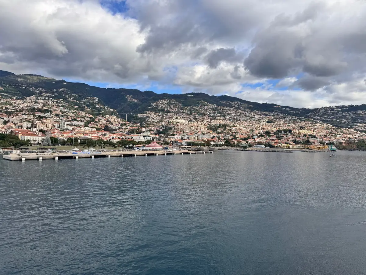 Panoramic view of Funchal and the mountains behind it, seen from the Atlantic, Madeira