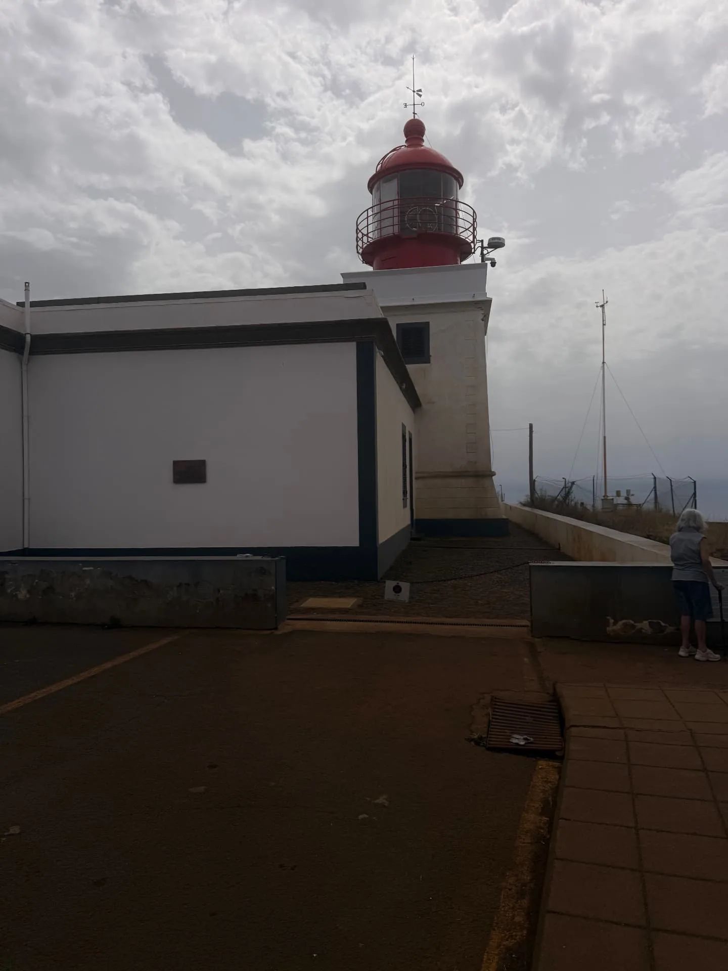 Ponta do Pargo lighthouse with its red lantern above the white keeper's building