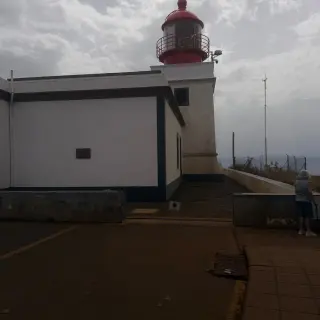 Ponta do Pargo lighthouse with its red lantern above the white keeper's building