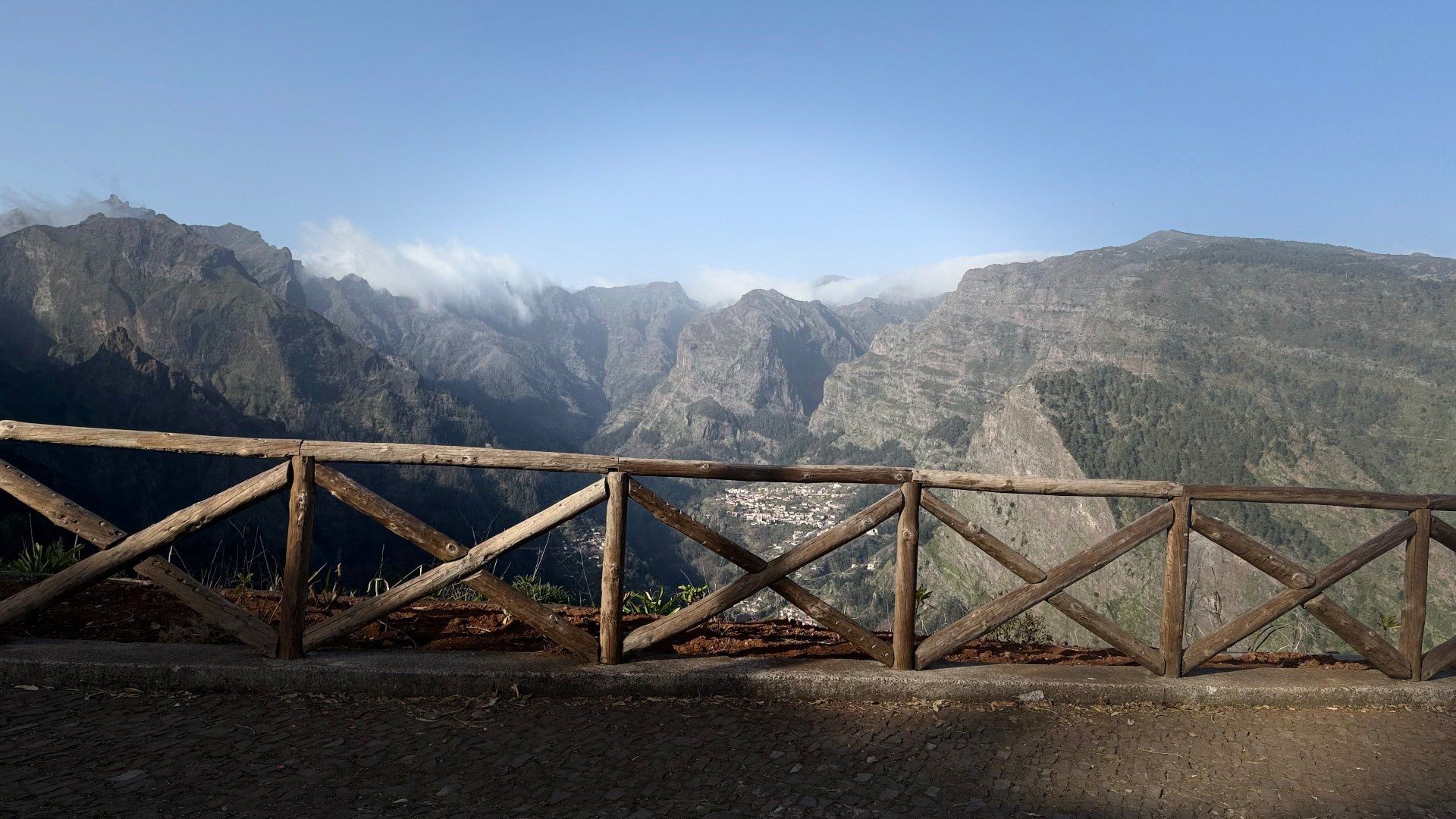 Wooden fence at Boca dos Namorados viewpoint overlooking Curral das Freiras, Madeira